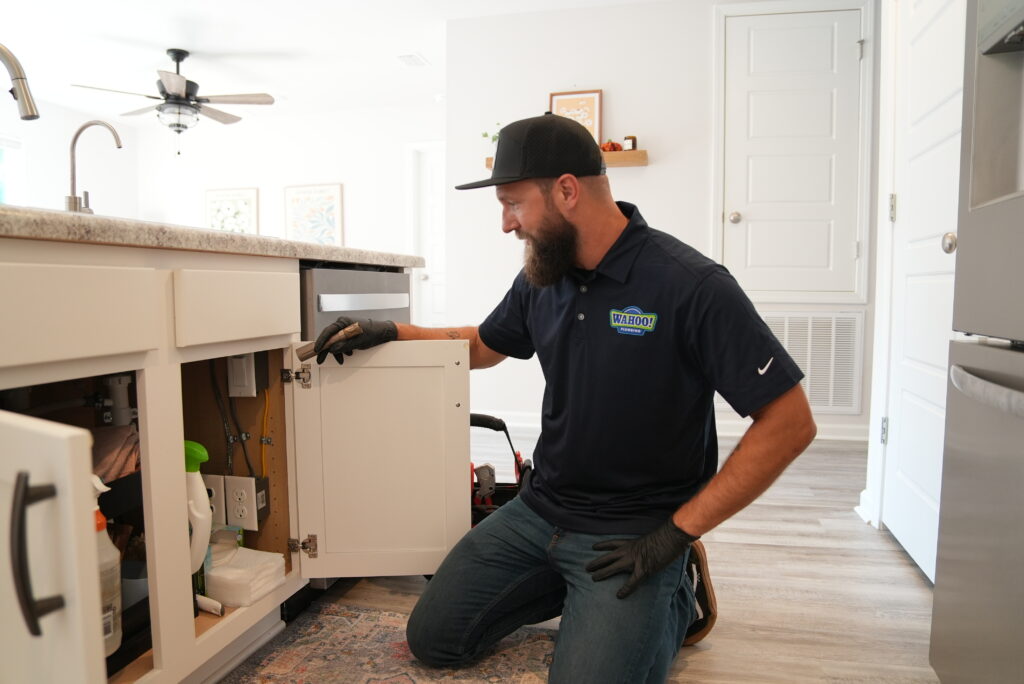 Kitchen & Bath Plumbing Repair Services checking kitchen